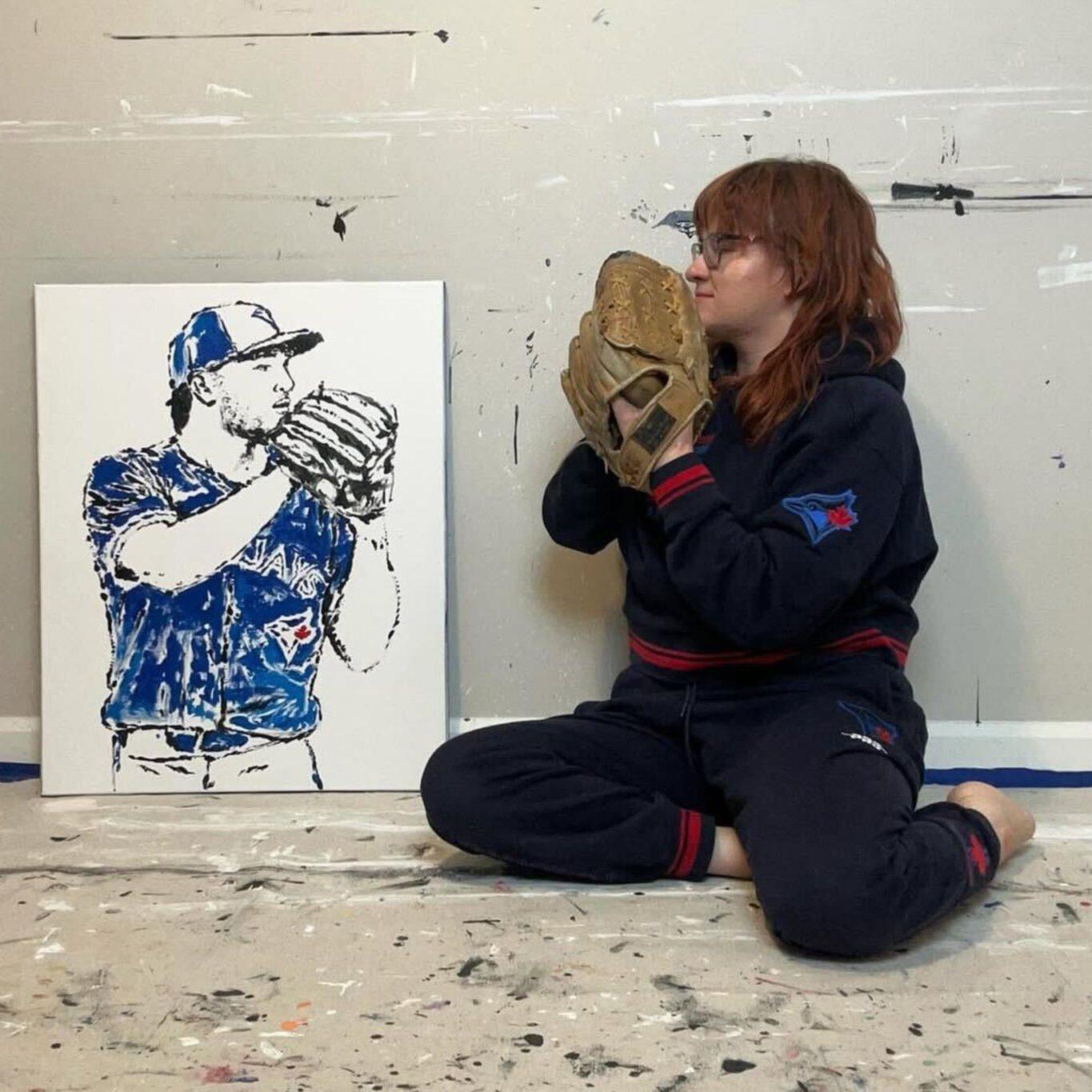 Artist uses baseball bats and balls to create paintings of Blue Jays